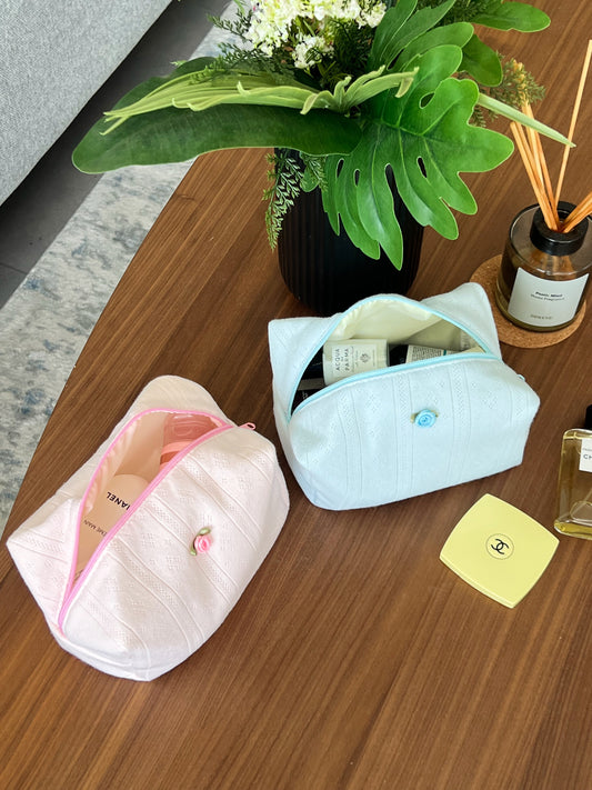 pink and blue makeup bags. perfect for beauty essentials and travel.