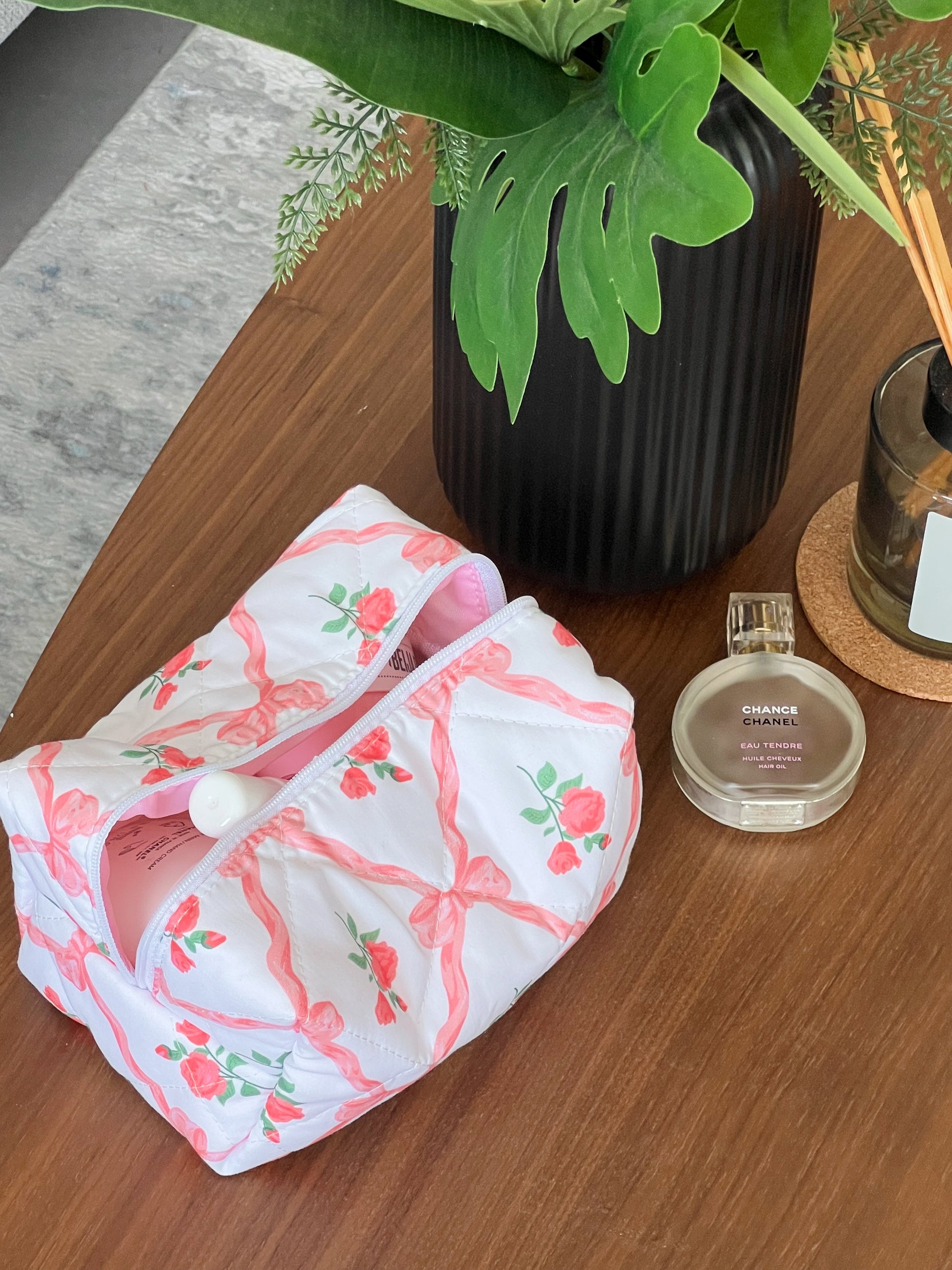 pink beauty bag with bows and roses. Aesthetic beauty pouch. For skincare, makeup and beauty essentials.