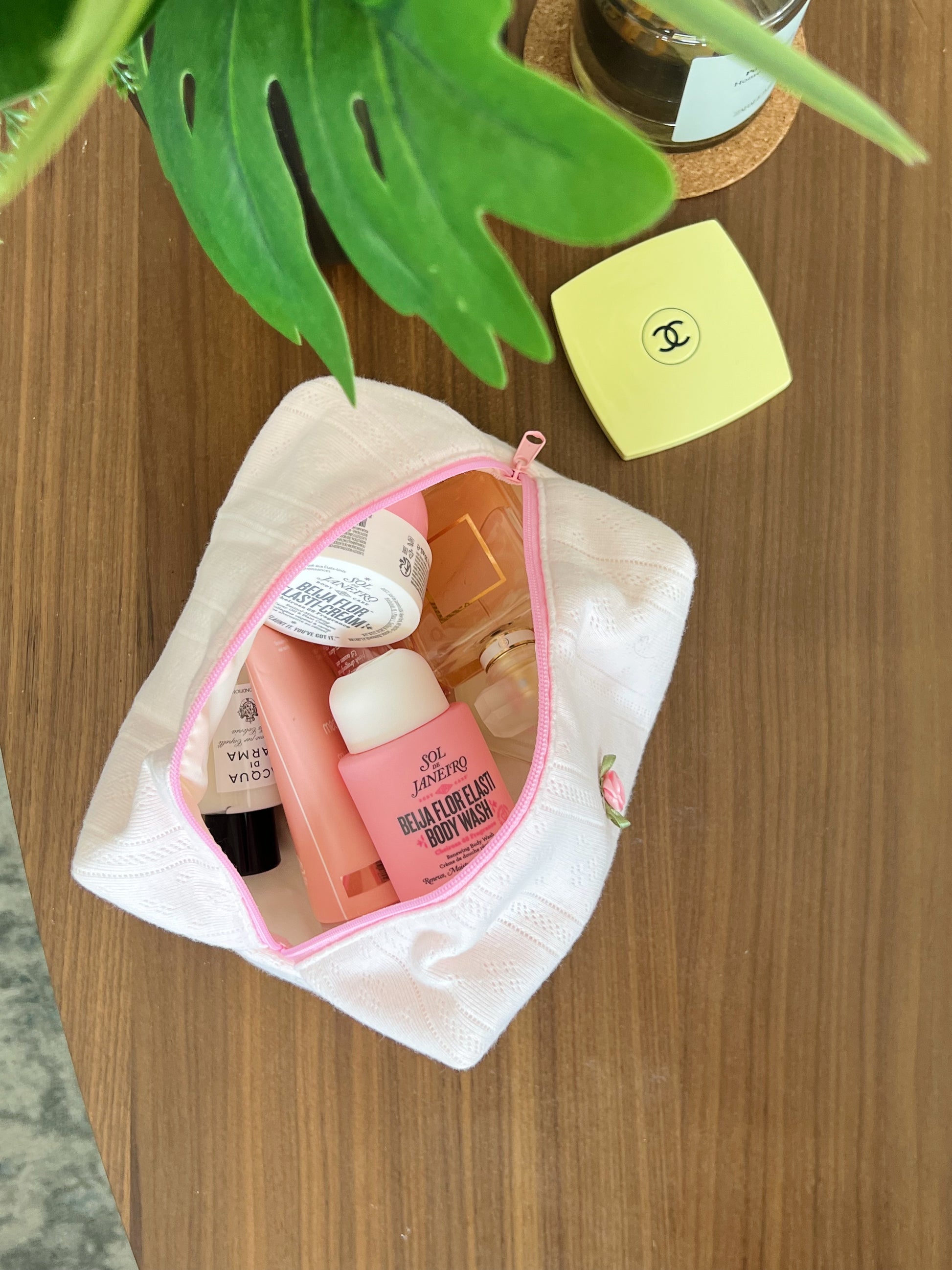 Pink beauty pouch. Use for travel and beauty essentials. Makeup bag.