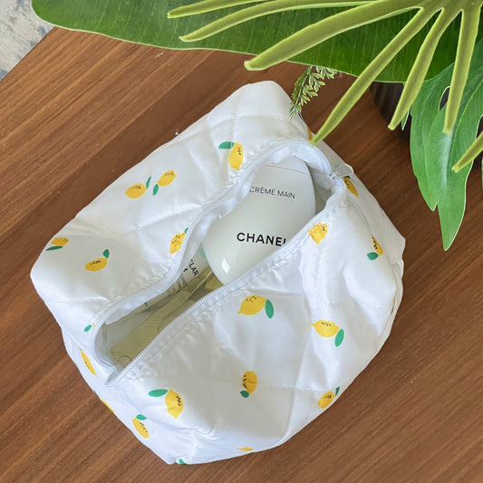 Makeup bag with lemon designs. Beauty pouch for makeup. skincare and beauty essentials.